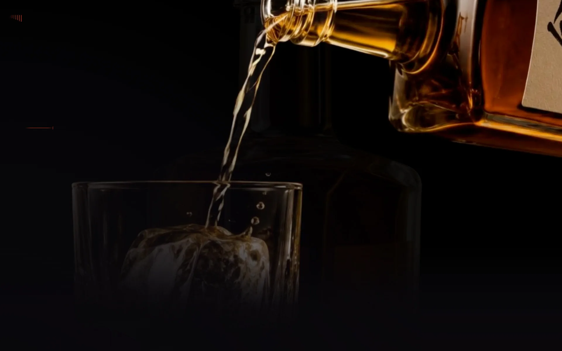 The pour leg filling the screen, with a short vermilion rule sitting alone in the empty left margin.