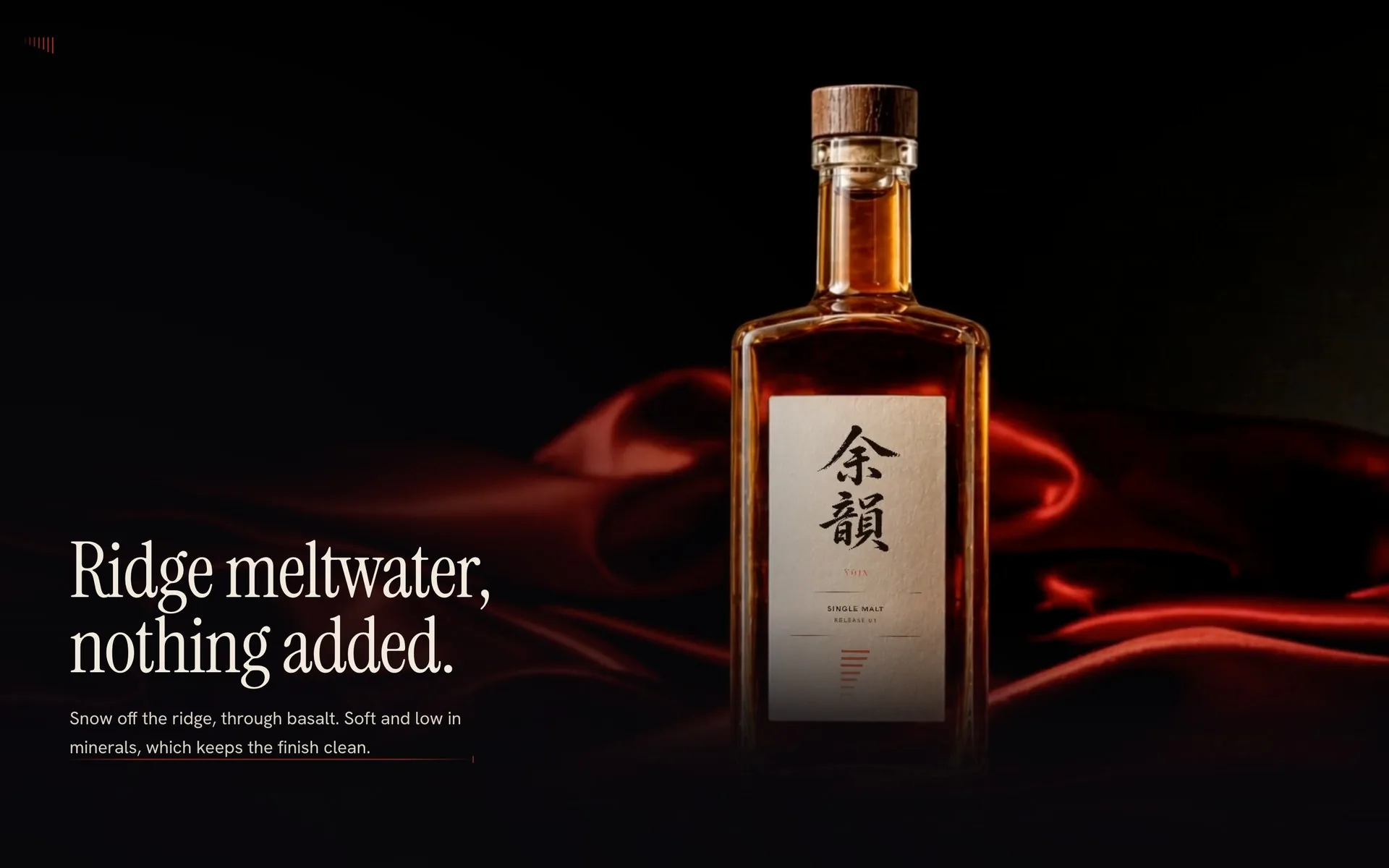 The bottle on red silk with a serif headline and one paragraph set at the left, the vermilion rule now running the full width of the copy column beneath them.